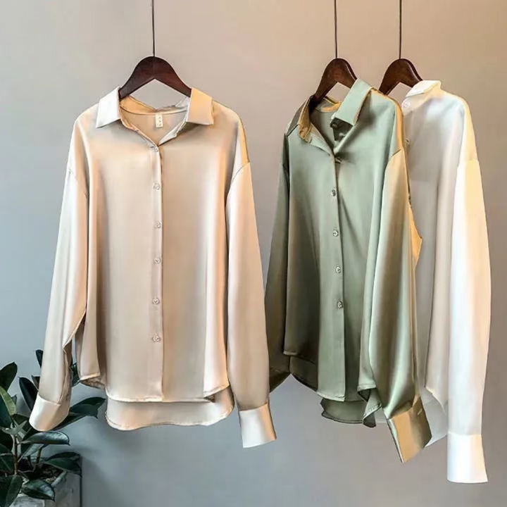 Stijlvolle damesblouse, retro design. Klassieke pasvorm met lange mouwen, comfortabel en chique voor de moderne vrouw.