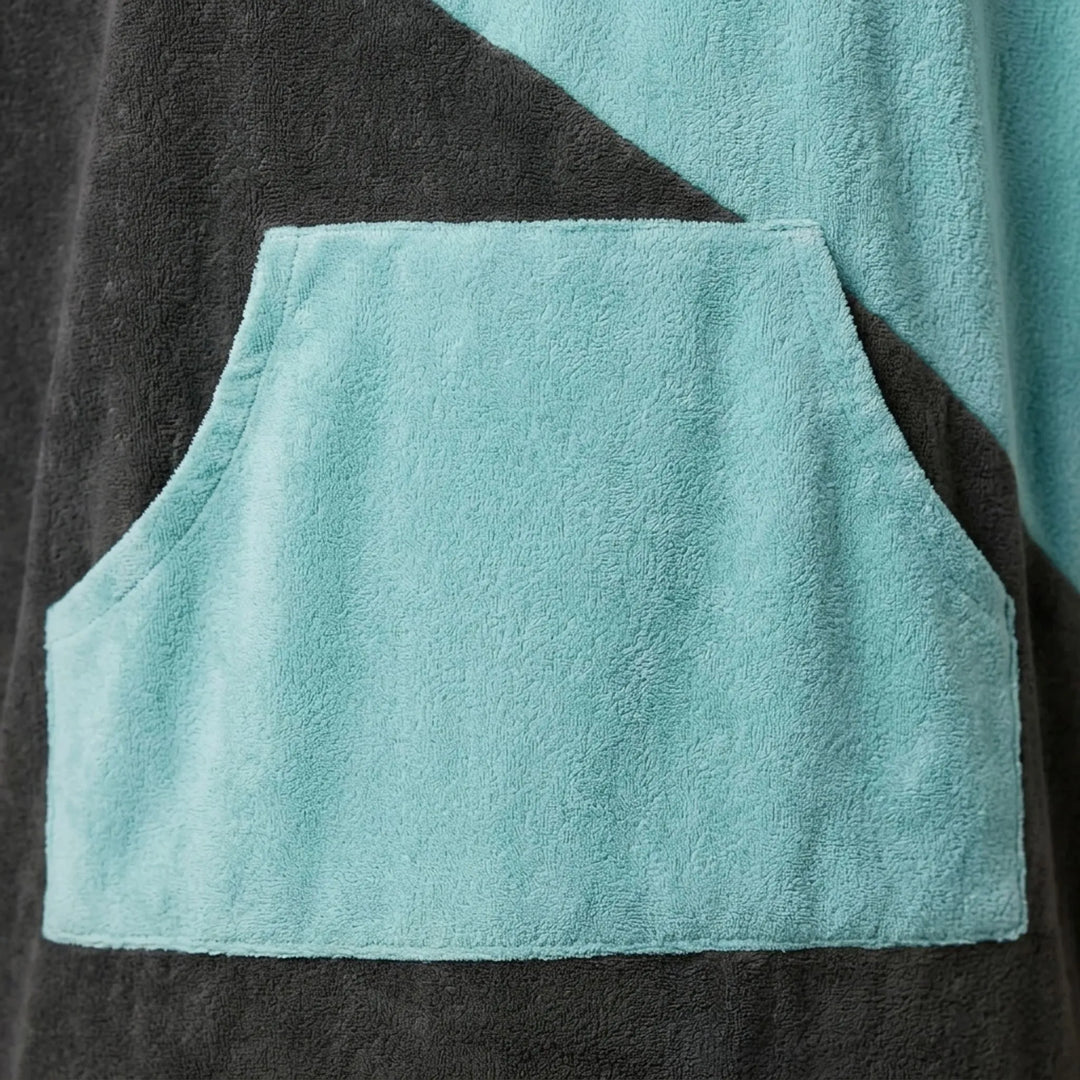 Veelzijdige unisex zwemponcho met capuchon; makkelijk omkleden voor heren en dames bij strand of zwembad.