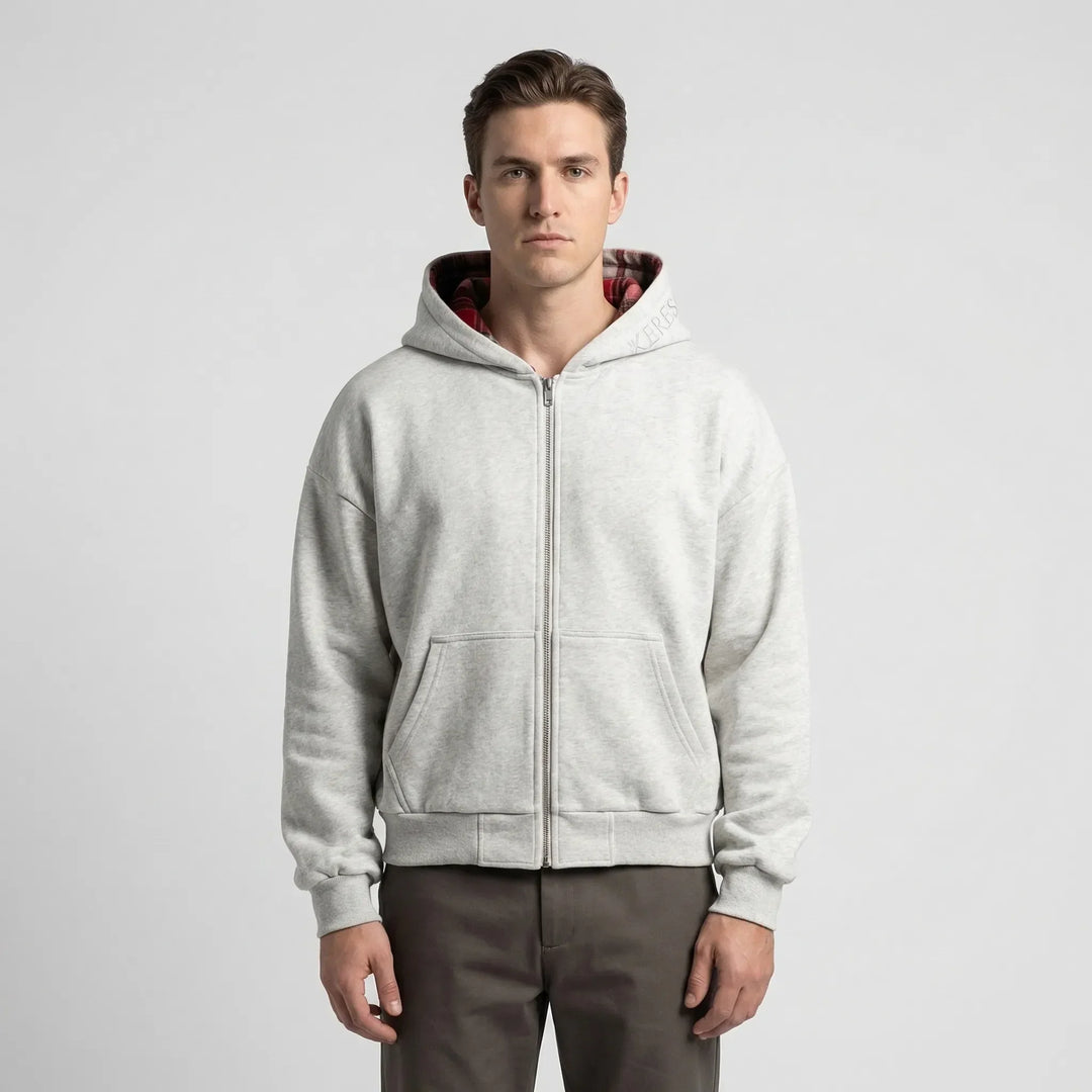 Grijze en zwarte omkeerbare oversized heren hoodie Josh. Twee comfortabele streetwear looks in één sweatshirt.