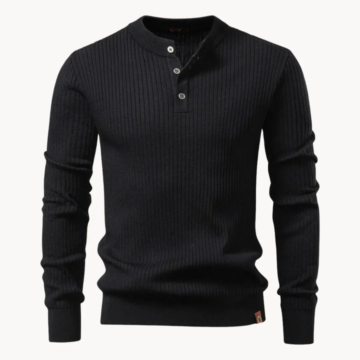 Heren trui met geribbelde structuur, ronde hals en knoopsluiting. Comfortabele herfstmode.