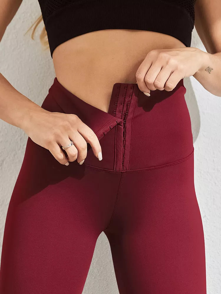 Dames sportbroek met hoge taille en corset, optimale compressie voor sport.