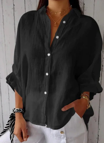 Elegante damesblouse met lange mouwen en knoopsluiting; veelzijdig voor elke relaxte zomeroutfit.