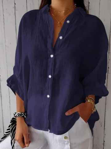 Trendy dames top met knoopsluiting, relaxte pasvorm en lange mouwen, ideaal voor lente en zomer.