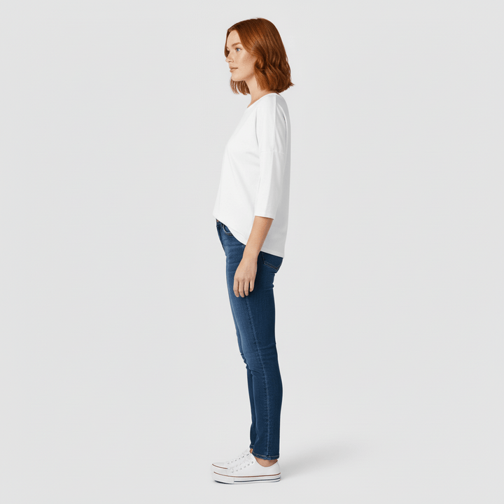 Veelzijdig dames T-shirt met driekwartmouwen, rondhals en effen kleur, perfect als basisstuk.