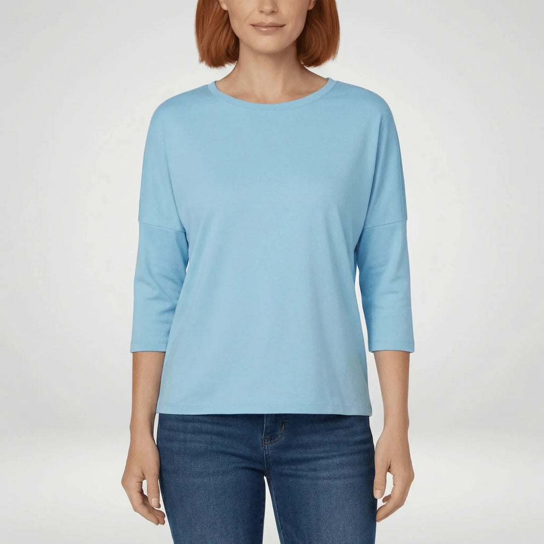 Dames top met ronde hals en 3/4 mouwen, een elegant en comfortabel basisstuk voor diverse outfits.