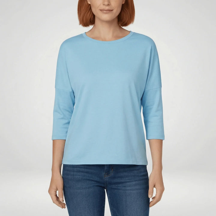 Dames top met ronde hals en 3/4 mouwen, een elegant en comfortabel basisstuk voor diverse outfits.