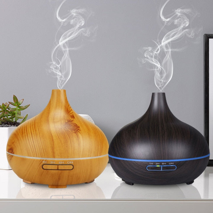 Stille ZenMist diffuser met afstandsbediening; functioneert als luchtbevochtiger en sfeerlicht voor zen momenten.