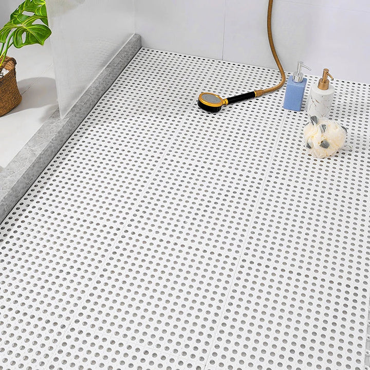 Duurzame rubberen antislipmat GripDrop voor douche en bad; hygiënisch, schimmelvrij en eenvoudig te reinigen.