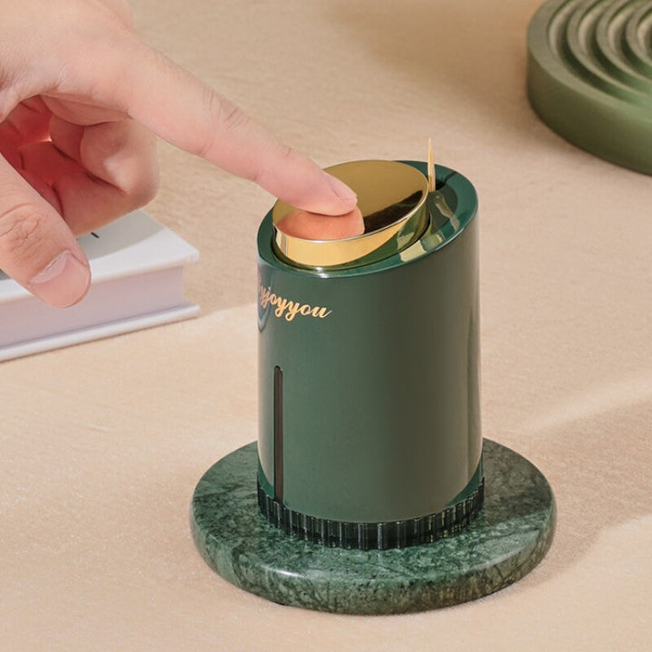Stijlvolle design tandenstokerhouder voor een georganiseerde tafel; automatische pop-up functie voor gemak.