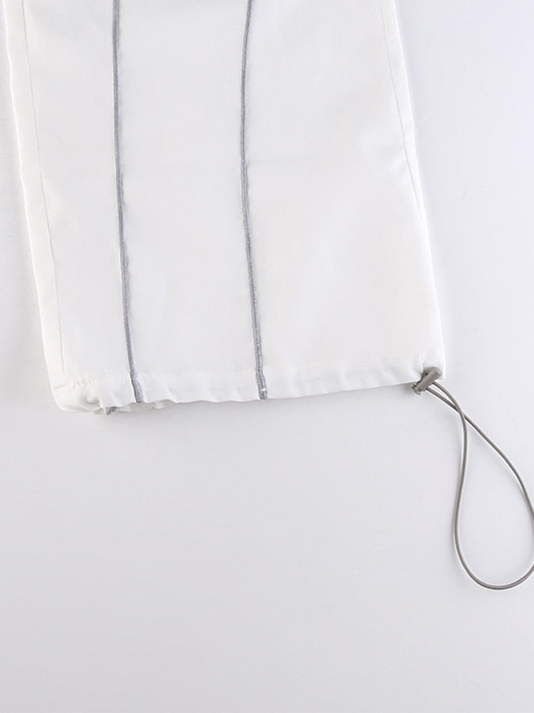 Trendy witte dames baggy broek streetwear, de ideale casual kleding voor comfort.