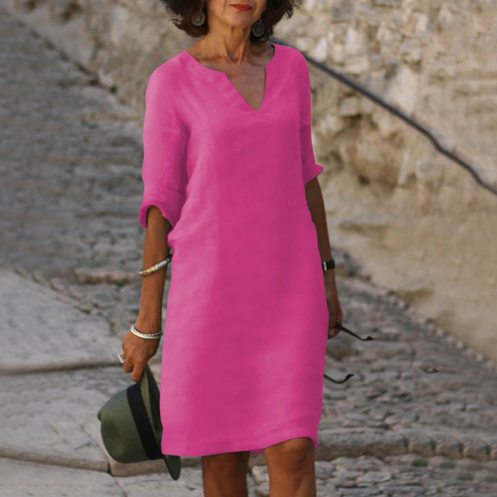 Kleurrijke dames midi-jurk met V-hals, comfortabele zomerjurk voor vakantie en warme dagen.