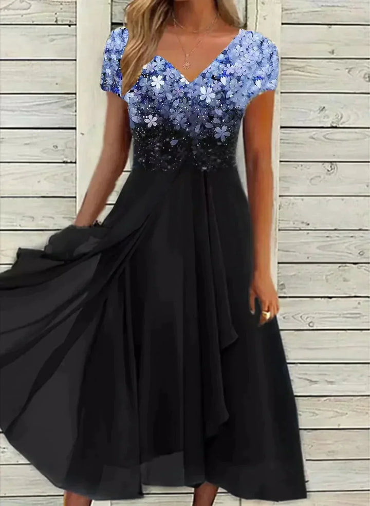 Elegante damesjurk met bloemenprint en v-hals, perfect voor zomerse dagen en feesten.