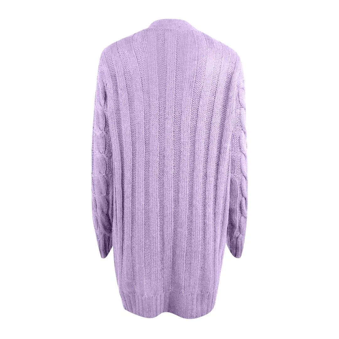 Detail van het gebreide damesvest, toont de zachte polyester textuur en stijlvolle afwerking.