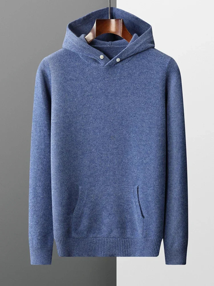 Gestapelde unisex hoodies in grijs, beige en blauw, klaar voor comfort en stijl in elke garderobe.