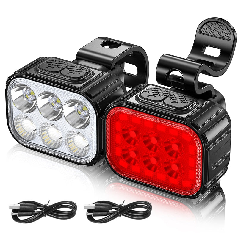 Duurzame LED fietslampen set voor- en achterlicht. Oplaadbaar, waterdicht, essentieel voor veilige nachtritten.