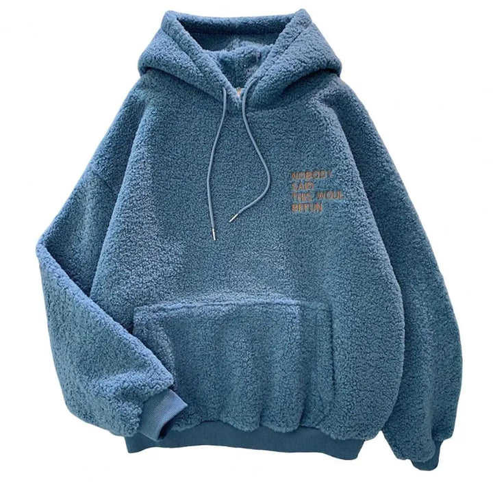 Dames winter hoodie met capuchon, warme loose fit trui. Comfortabel en veelzijdig voor casual look op koude dagen.