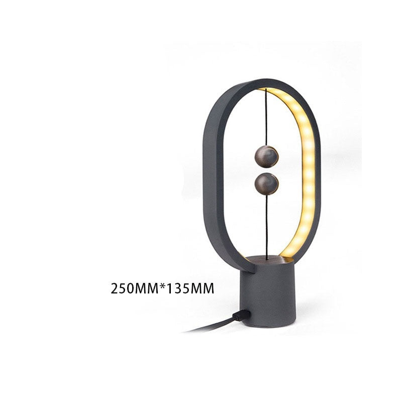 Betoverende tafellamp met zwevend licht. Creëer een magische sfeer met deze moderne LED decoratie.
