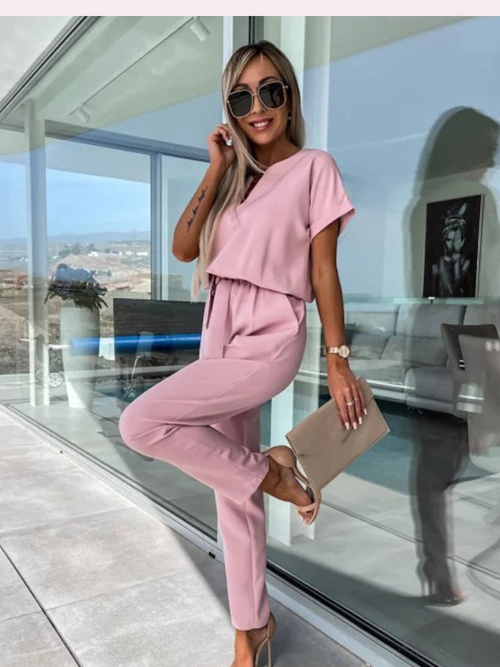Elegante Dames Patty jumpsuit met V-hals en korte mouwen, perfecte feestelijke of veelzijdige zomeroutfit.