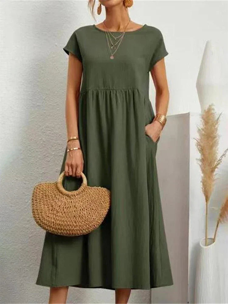 Elegante zomerjurk met vintage look. Modieuze O-hals damesjurk voor elke comfortabele gelegenheid.