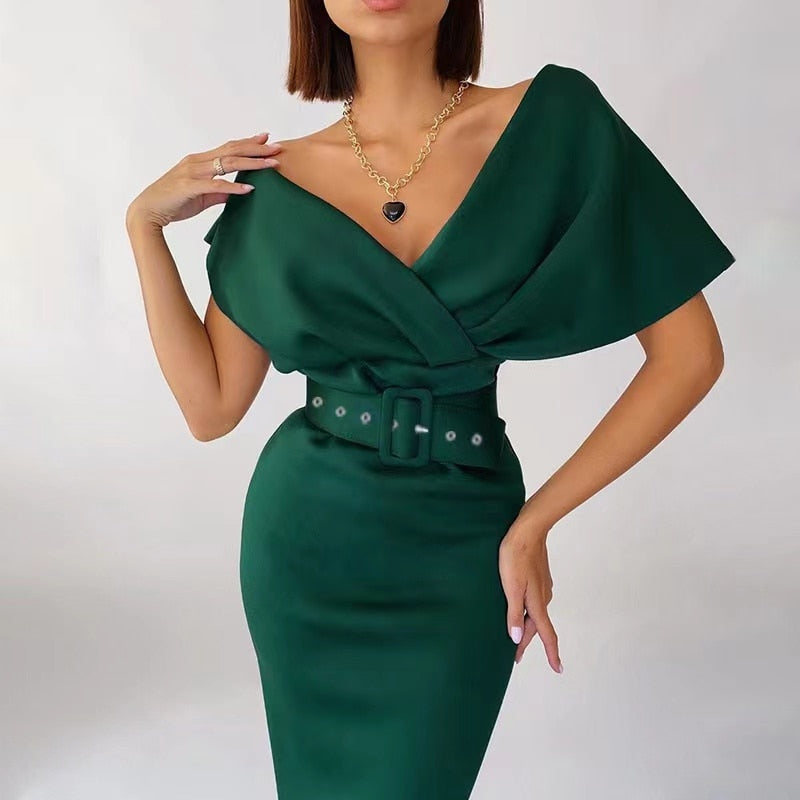 Grijze midi avondjurk voor vrouwen. Comfortabele en elegante feestjurk, ideaal voor speciale momenten.