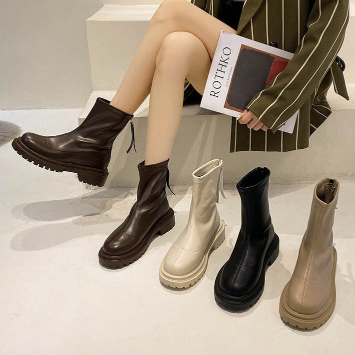 Zwarte Dames Xina plateau enkellaarsjes, comfortabele wintermode boots met robuuste zool voor casual look.