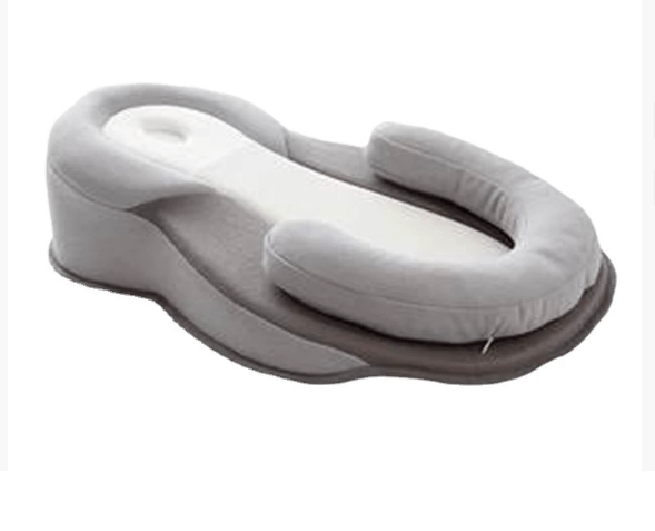 Duurzaam baby slaapkussen van katoen, ademend en comfortabel. Ondersteunt een veilige rugligging.