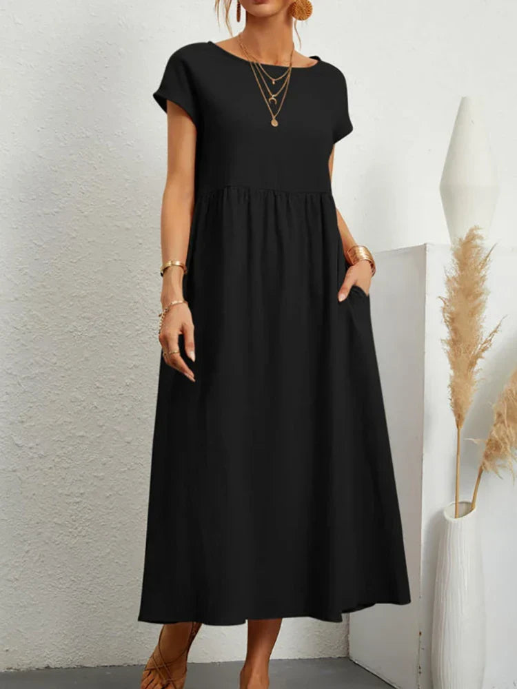 Comfortabele vintage zomerjurk. Elegante O-hals damesjurk voor casual dagen en zomerse mode.