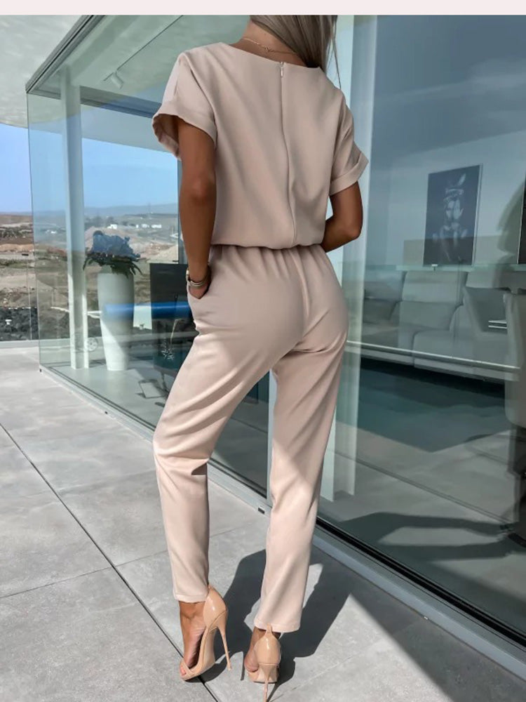 Dames Patty jumpsuit in rozenrood, zwart of kaki, met V-hals en korte mouwen, elegante zomerkleding.