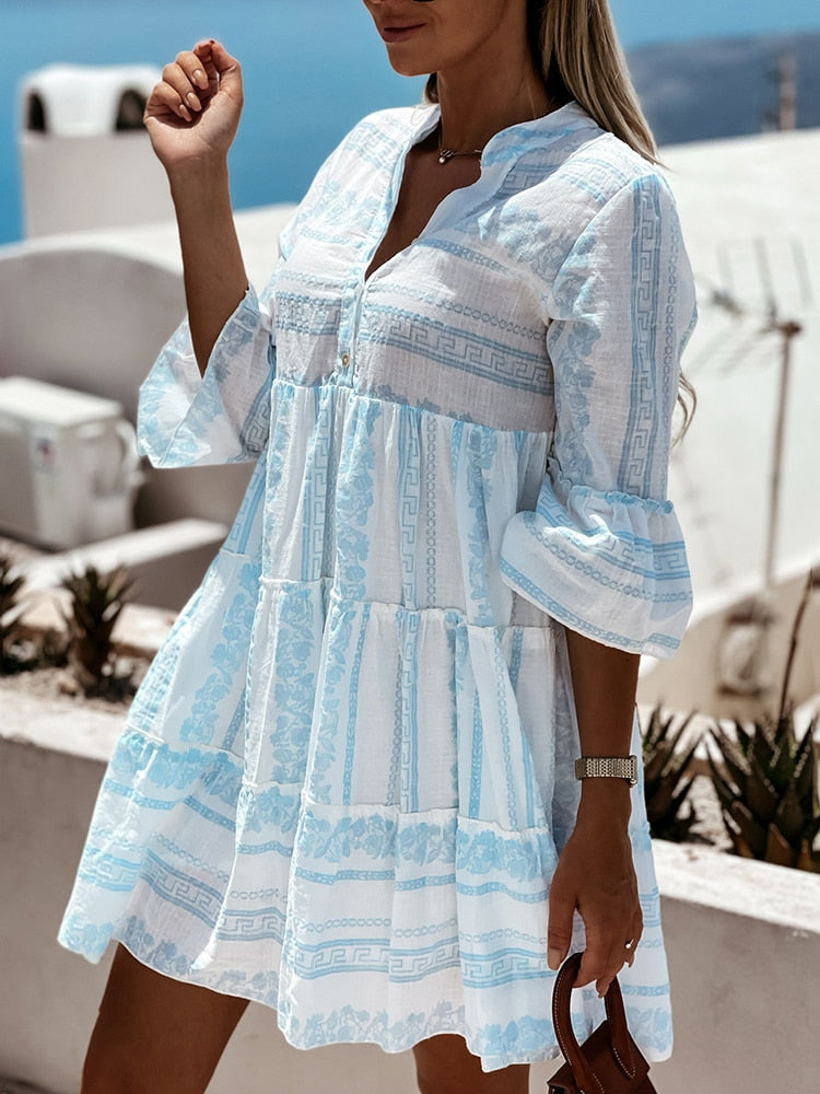Comfortabele groene zomerjurk: boho stijl met ruches en vrolijk patroon, perfect voor strand.