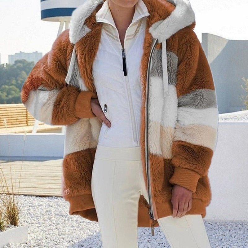 Modieus dames pluche vest met capuchon, comfortabele en warme pasvorm.