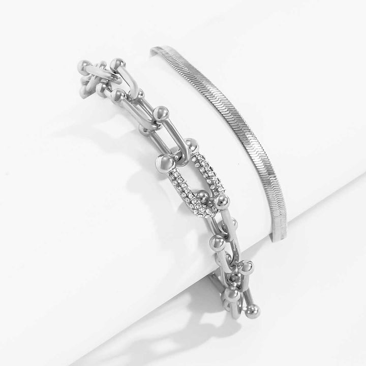 Complete dames sieradenset: 2 verstelbare armbanden in goudkleurig of zilverkleurig design.