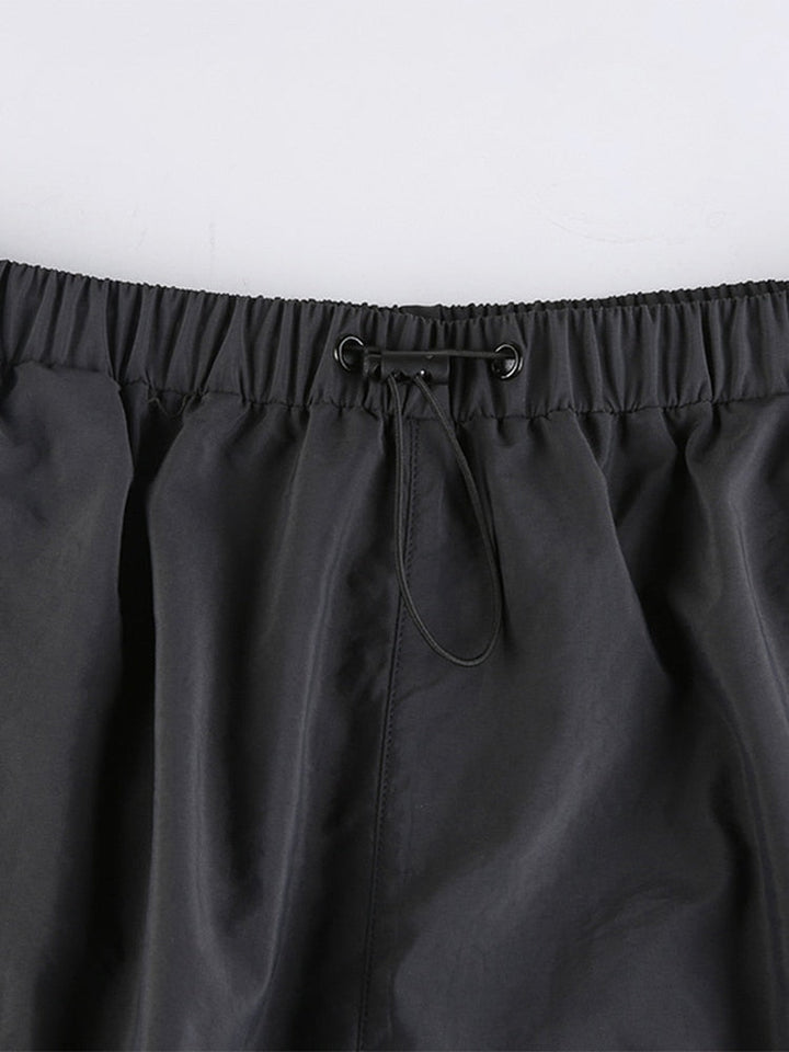 Witte dames baggy broek streetwear, de ultieme mix van comfortabele kleding en mode.