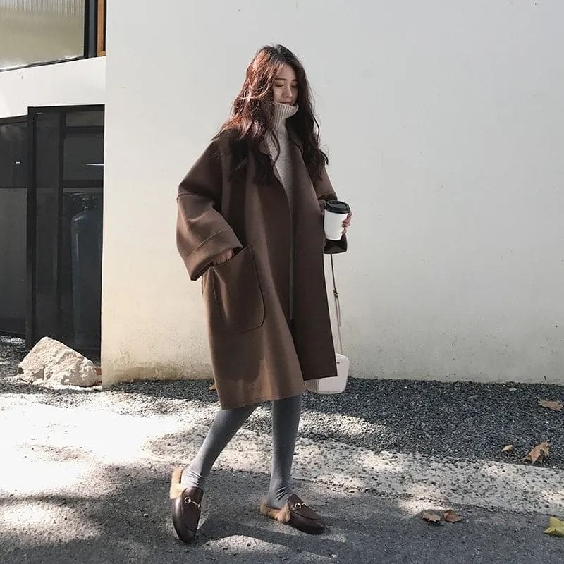 Stijlvolle oversized Aura trenchcoat voor dames, comfortabel en veelzijdig voor elke gelegenheid.