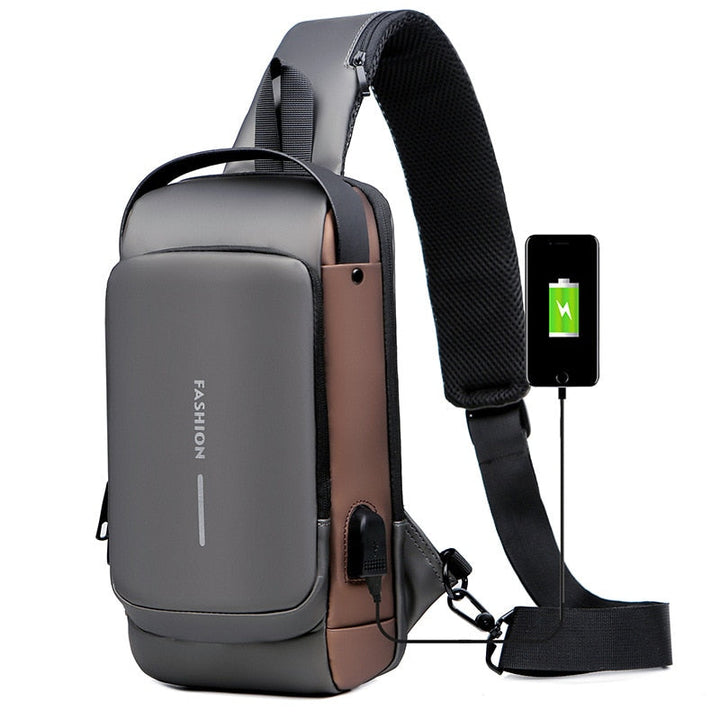 Julian unisex schoudertas, waterdicht, met veiligheidsslot en USB poort, ideaal voor reizen en avontuur.