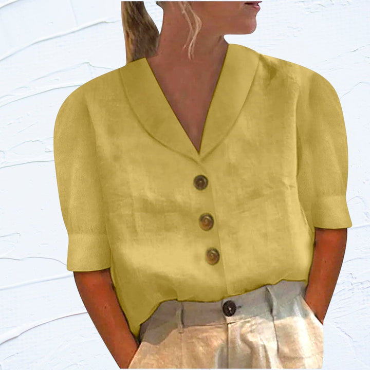 Modieuze dames blouse met kraag en knopen, creëert een klassiek elegante uitstraling. Perfect voor casual chic.