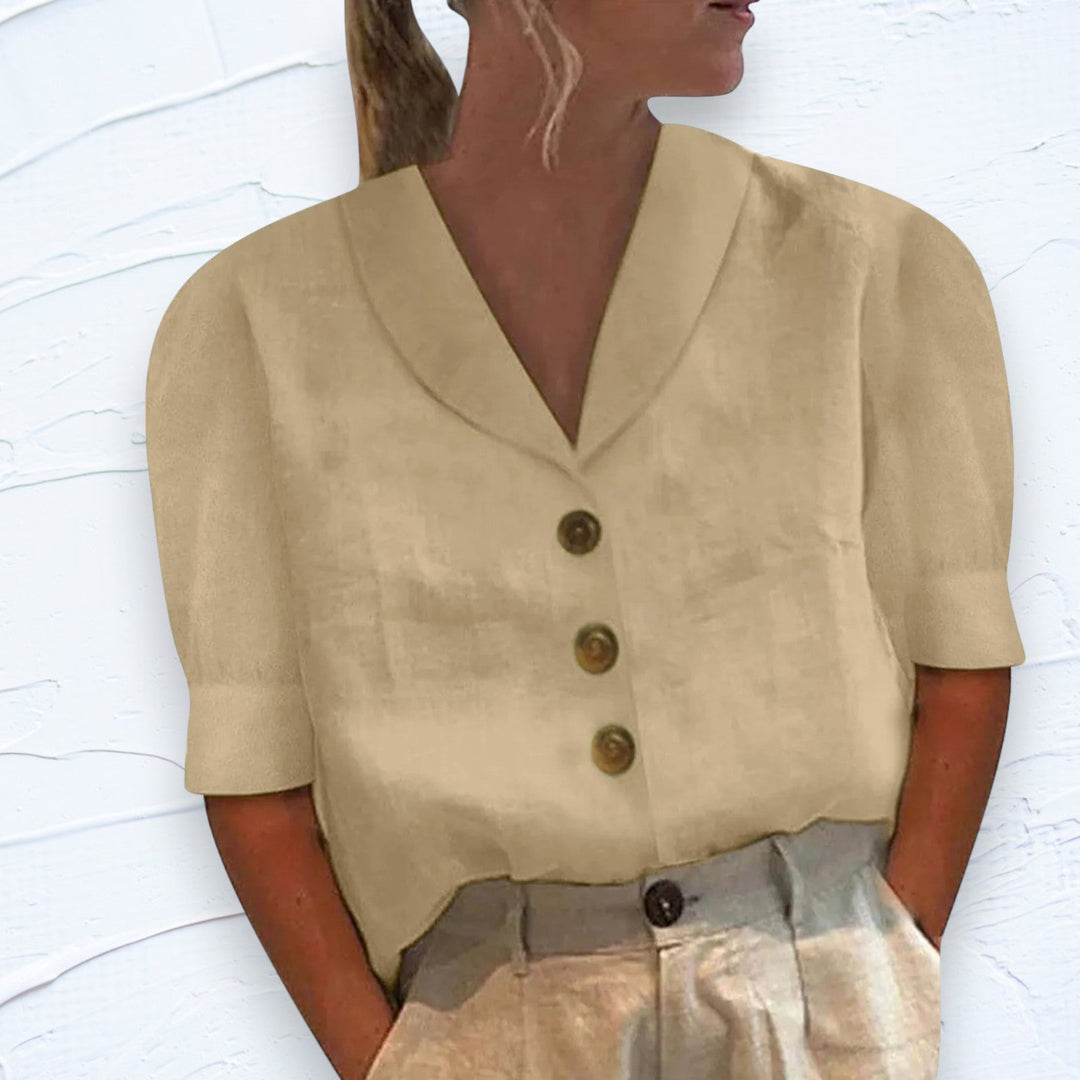 Grijze klassieke dames top met knopen en kraag, elegant en modieus. Perfect voor een casual chic look, comfortabel.