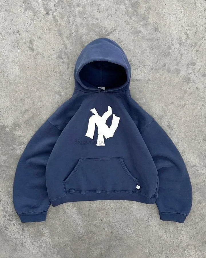 Zachte unisex hoodie met losse pasvorm, ultiem comfort voor een ontspannen en modieuze uitstraling.
