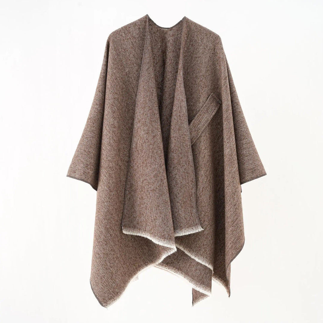 Retro chic damesponcho, zacht kasjmier look, ideaal voor een warme winter.