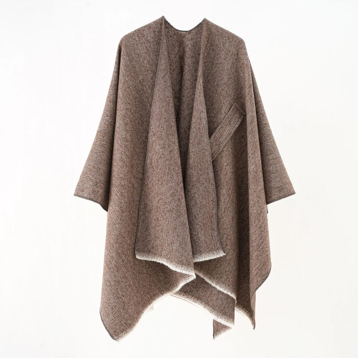 Retro chic damesponcho, zacht kasjmier look, ideaal voor een warme winter.