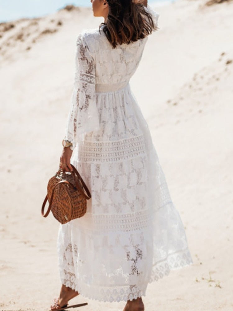 Stijlvolle witte mouwloze maxi strandjurk voor dameskleding, luchtig en elegant voor de perfecte zomer.