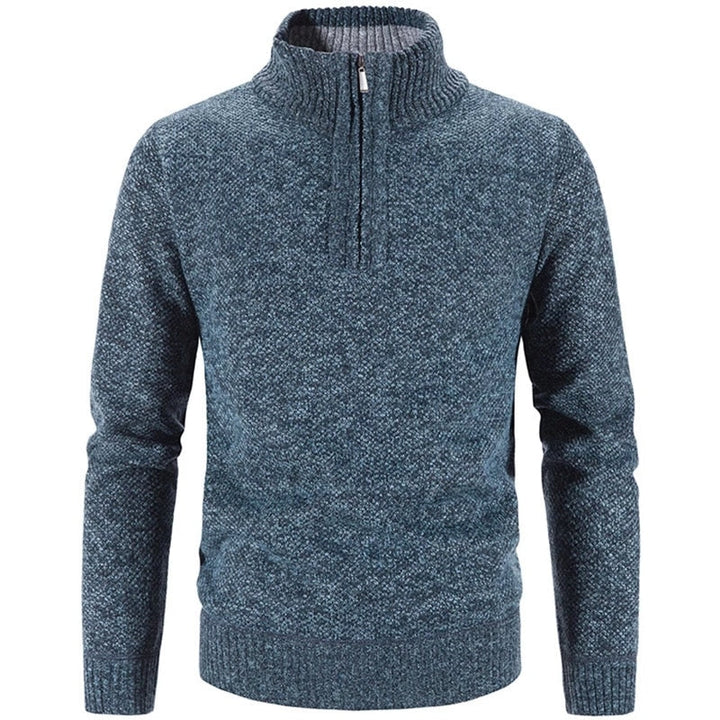 Gezellig heren vest met opstaande col en handige halve rits, essentieel voor koude dagen.
