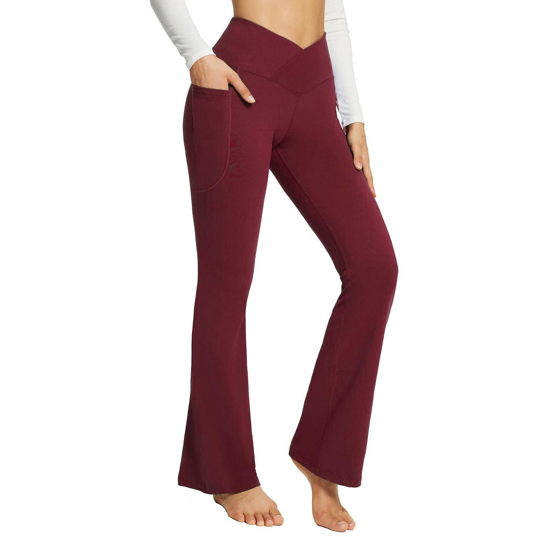 Dames yoga broek met hoge taille, wijde pijpen en zijzakken, ideaal voor comfortabele fitness & vrije tijd.
