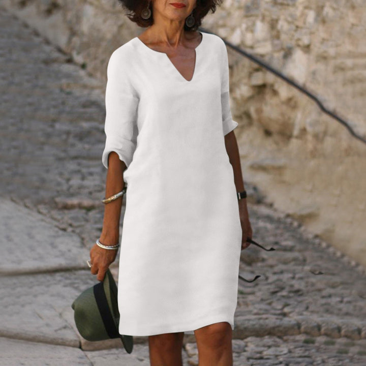 Luchtige dames zomerjurk met V-hals, elegante midi-jurk voor warme dagen, perfecte vakantiejurk.
