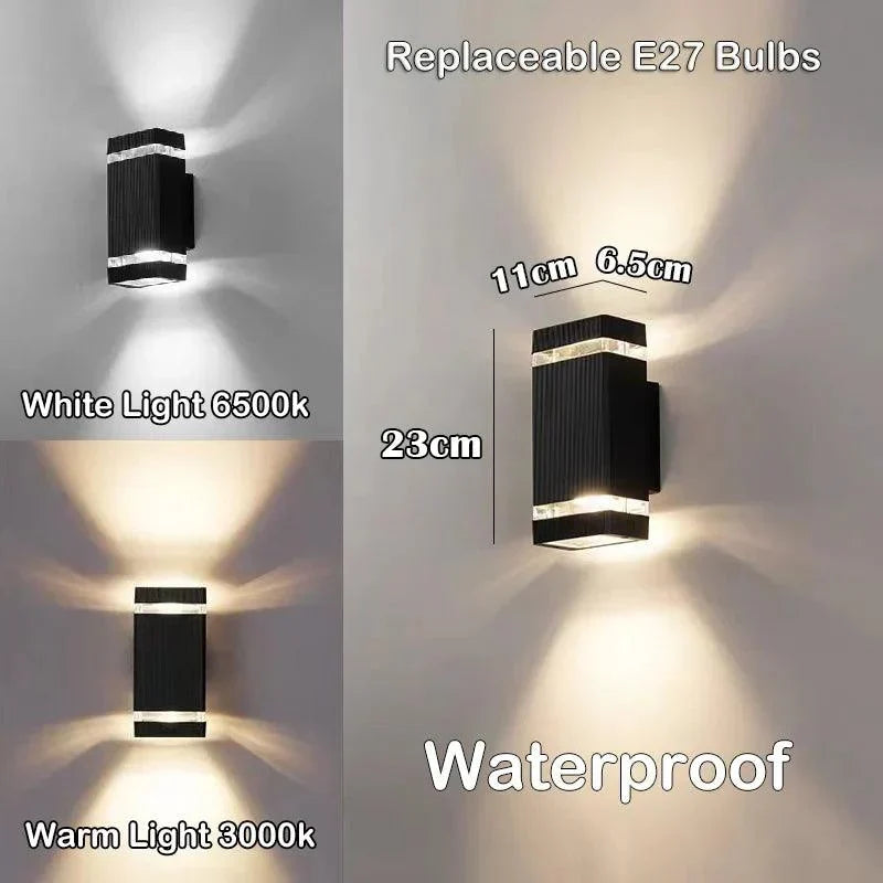 Zwarte, moderne LED buitenlamp met krachtig up & down licht, voor stijlvolle en functionele gevelverlichting.
