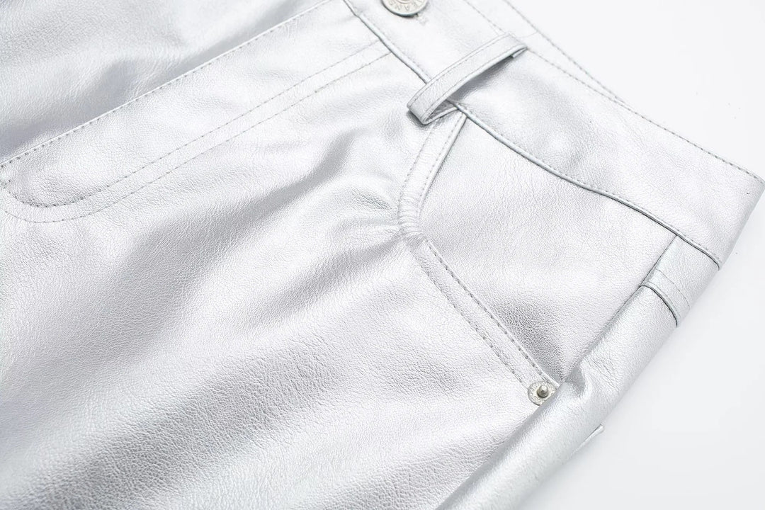 Hoge taille metallic damesbroek, comfortabel en trendy. Losse pasvorm, perfect voor een feestelijke look.
