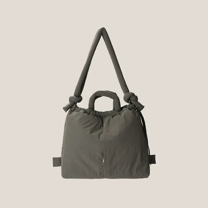 Veelzijdige zwarte dames puffer handtas. Te dragen als schoudertas of handtas, trendy, comfortabel en praktisch.