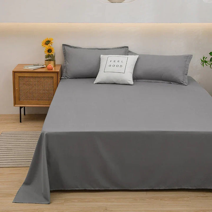 Close-up van de zachte textuur van het effen linnen dekbedovertrek SoftLuxe. Comfortabel en duurzaam textiel.