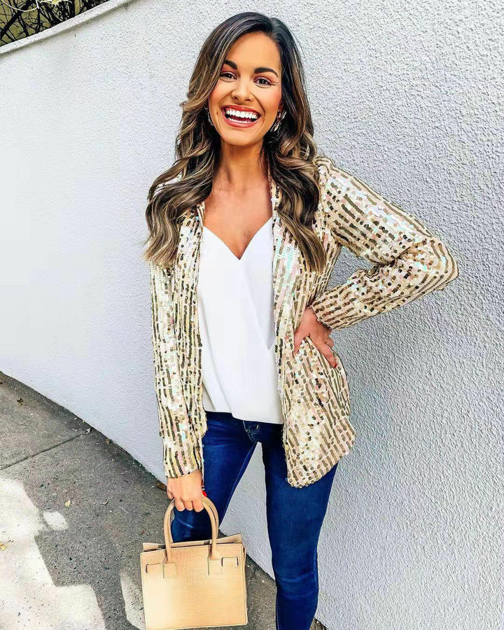 Loose fit glitter blazer voor dames. Stijlvolle feestkleding met lange mouwen, perfect voor uitgaan en speciale avonden.