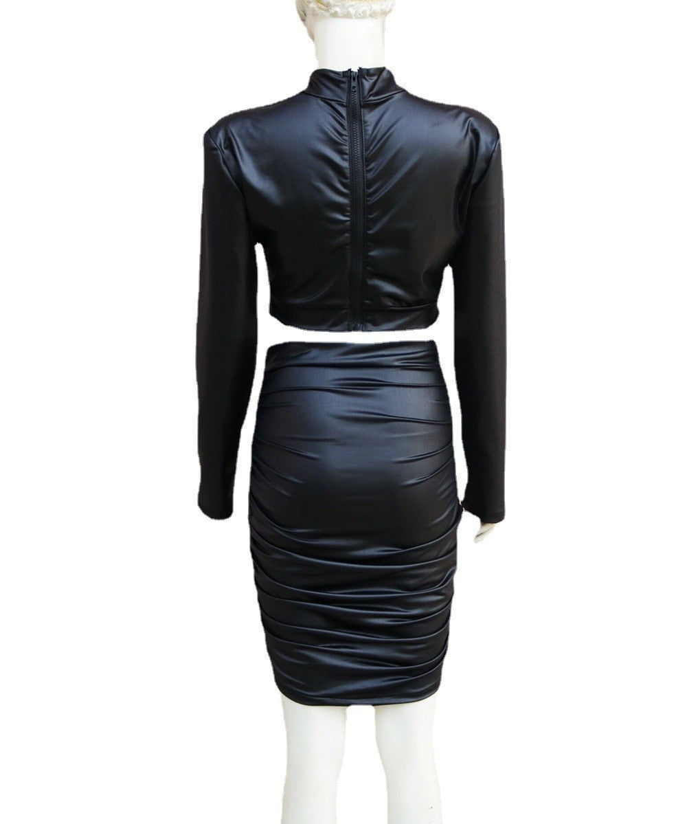 Feestelijke Gracy dameskleding set: sexy imitatieleer croptop en bijpassende rok voor een stijlvolle uitstraling.