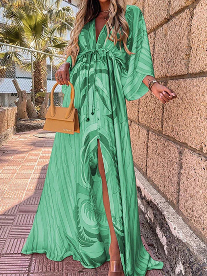 Elegante Zamara damesjurk met stijlvolle print, een must-have voor zomerse vakanties en stranduitjes.